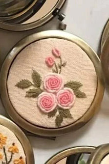 
  
  Floral Embroidered Mirror Compact
  
