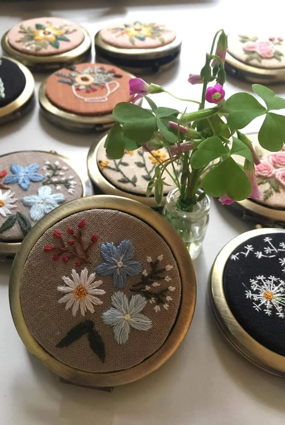 
  
  Floral Embroidered Mirror Compact
  

