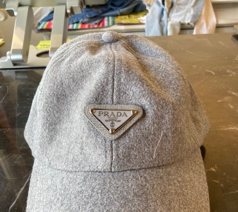 
  
  Upcycled Designer Logo Hats
  
