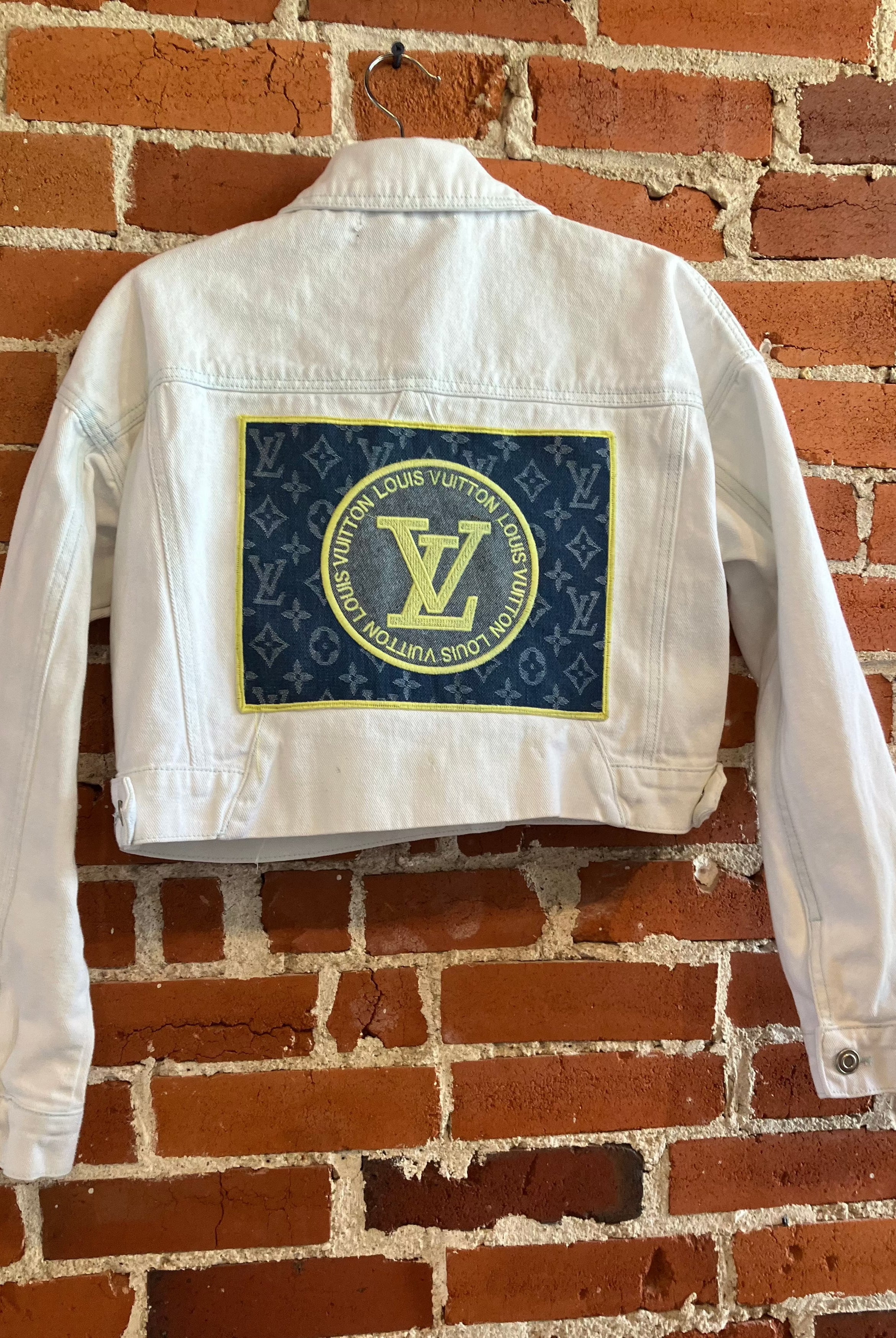 
  
  Upcycled jacket with Louis Vuitton patch
  
