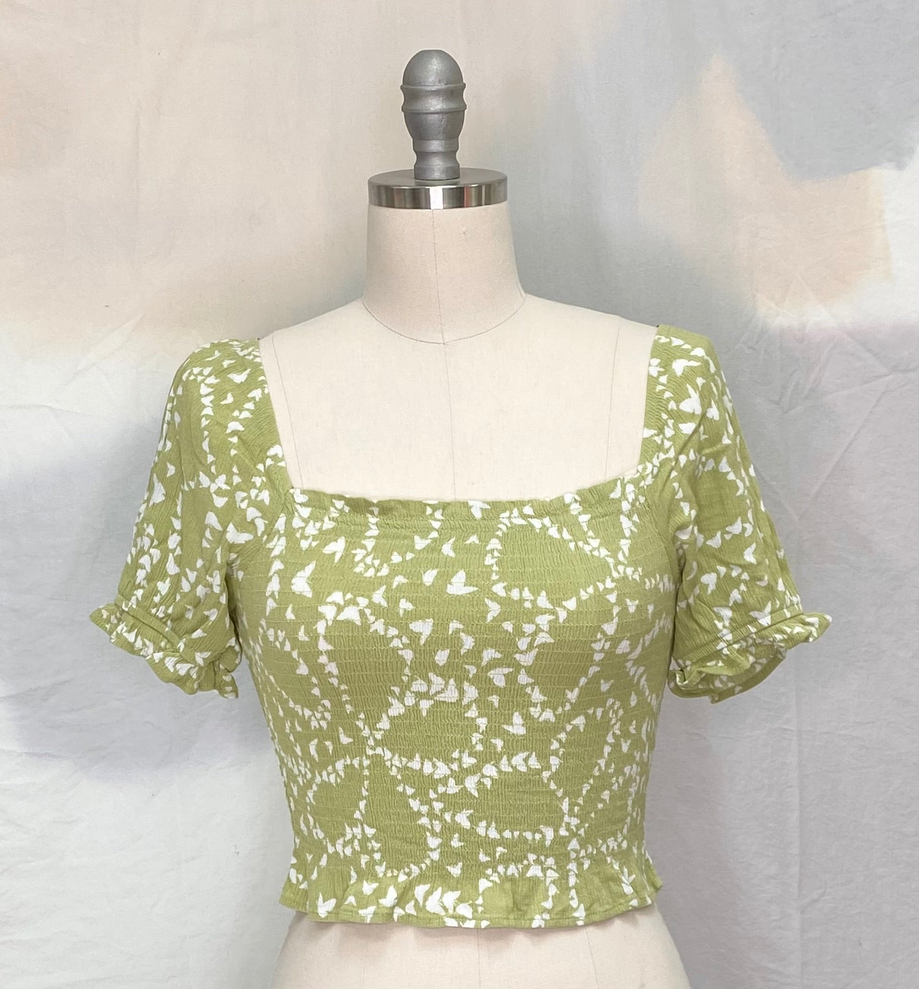 
  
  SO green smocked top
  
