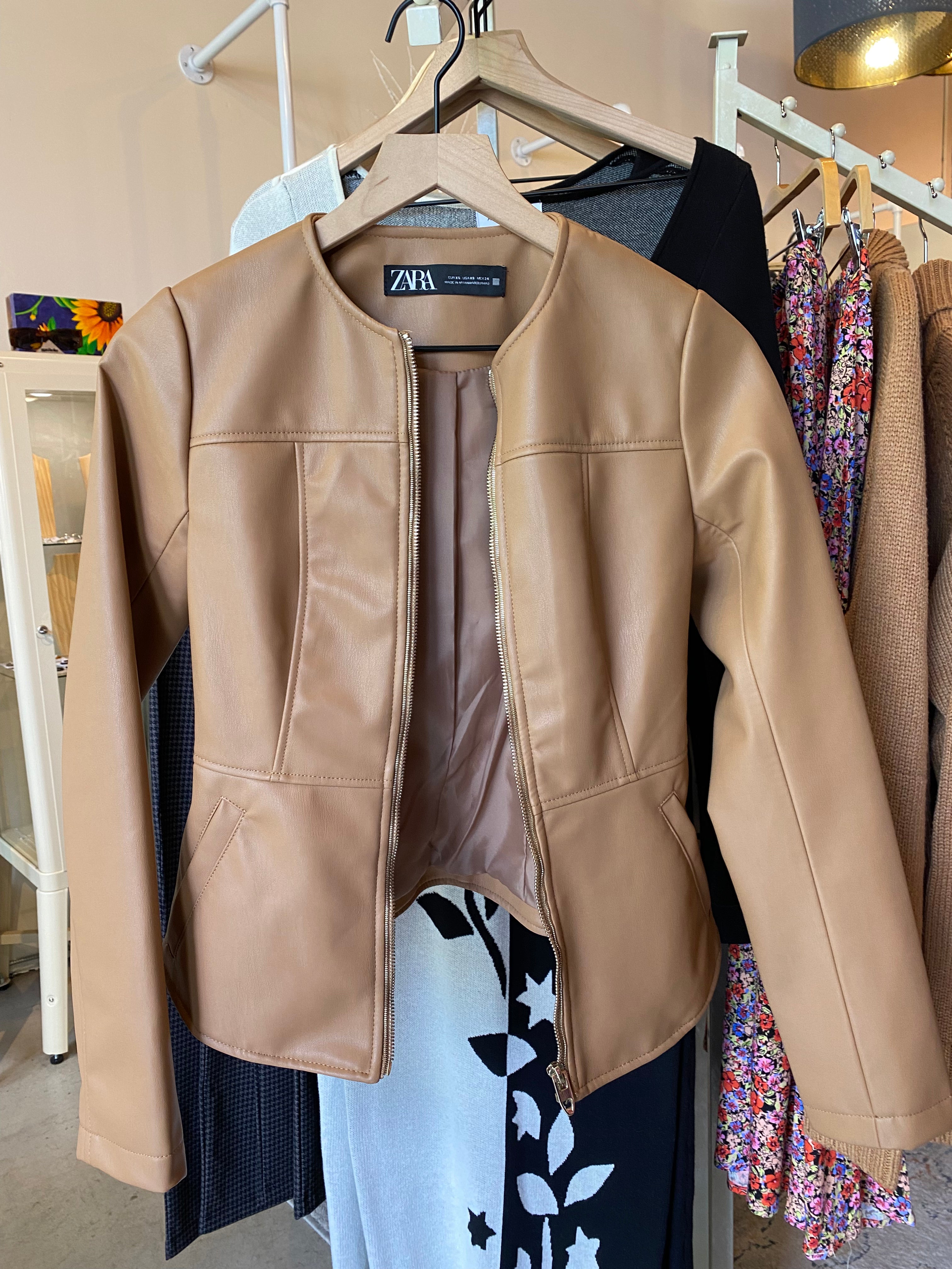 
  
  Zara Faux Leather peplum Jacket
  
