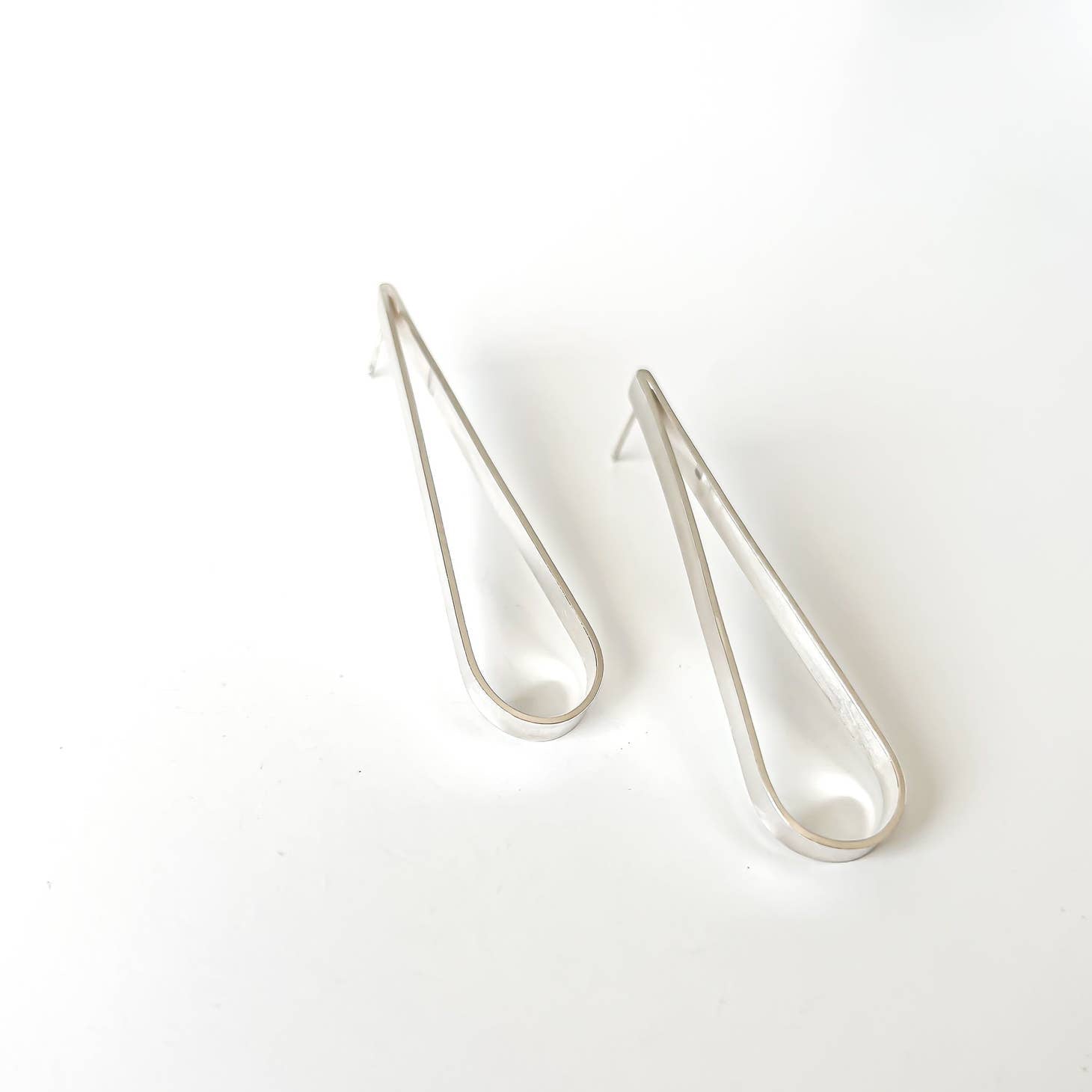 
  
  Raquel Paiz Baga Earrings Silver
  
