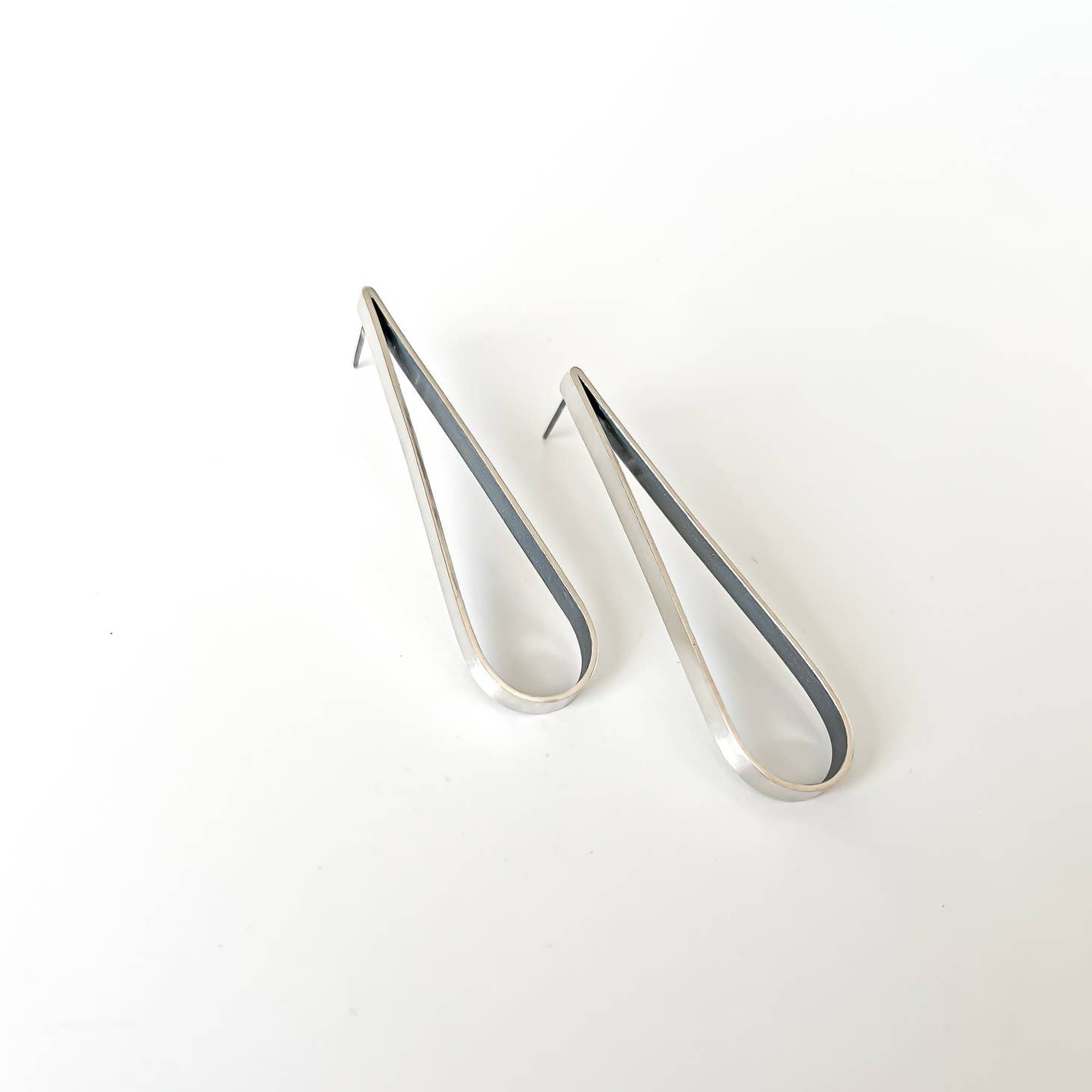 
  
  Raquel Paiz Baga Earrings Silver
  
